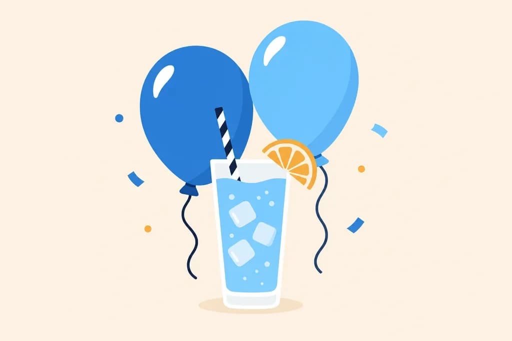 Balloons next to a glass of soda with lemon
